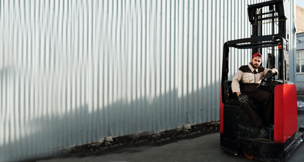 Hangcha - Noble Philippines: forklift operator using very narrow aisle forklift